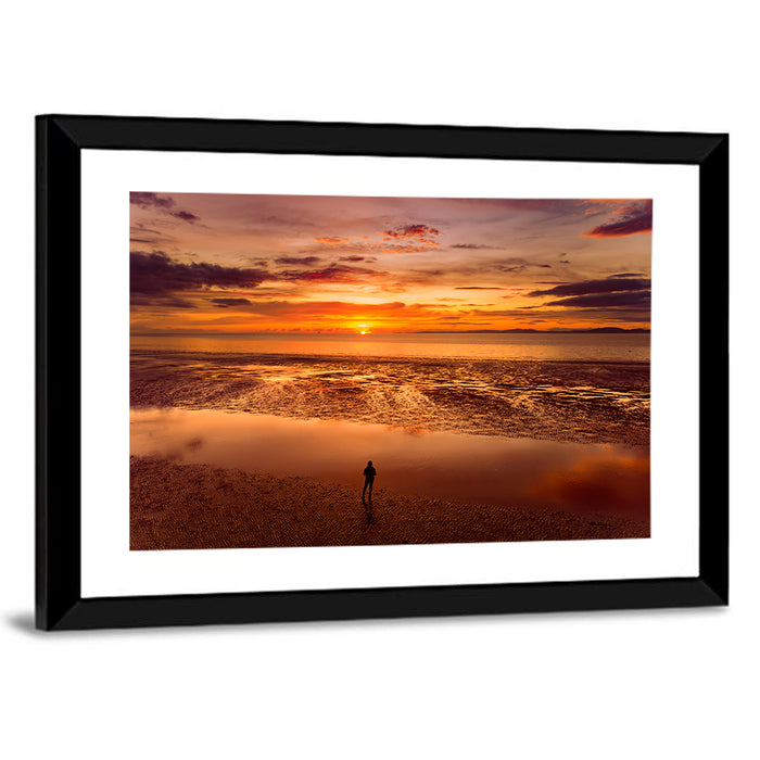 Solitary Figure on Sunset Shore Wall Art as a framed print