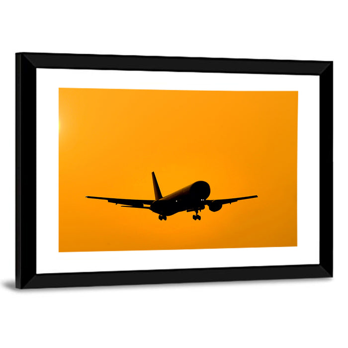 Golden Hour Airliner Silhouette Wall Art as a framed print