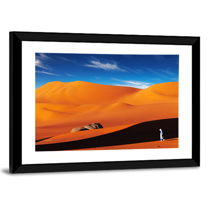 Solitary Figure on Sahara Dunes Wall Art as a framed print
