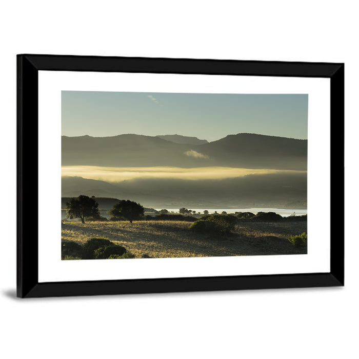 Lake Omodeo Morning Mist Wall Art as a framed print