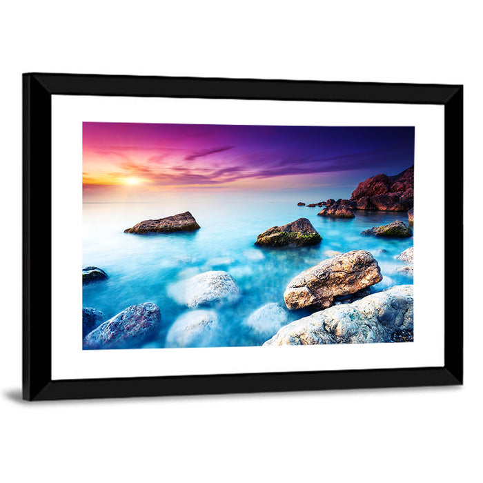 Rocky Beach Sunset Wall Art as a framed print