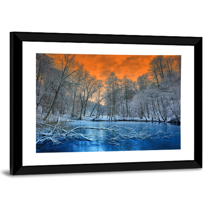 Sunset Over Winter Forest Lake Wall Art as a framed print