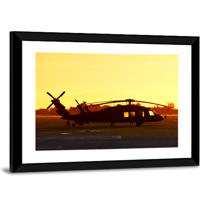 Row of Military Helicopters at Dusk Wall Art as a framed print
