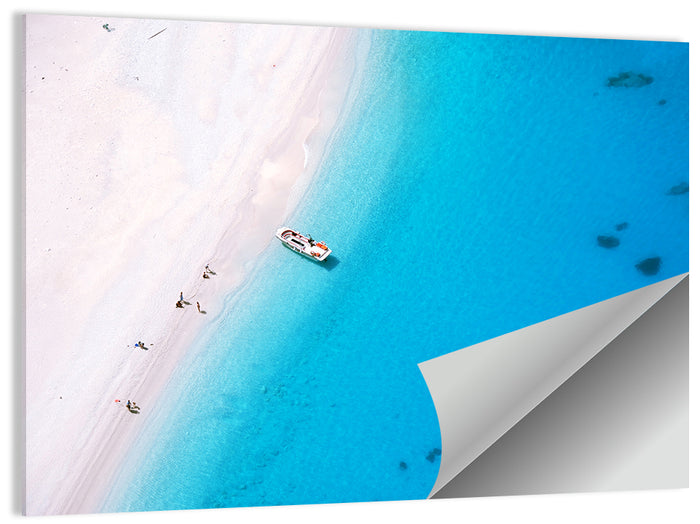Aerial Beach Bay with White Boat Wall Art as a poster print