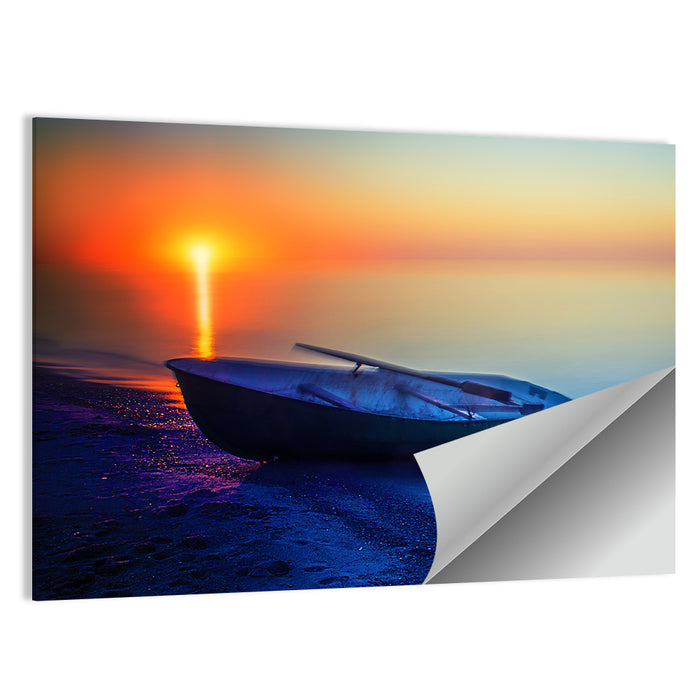 Rowboat on Sandy Shore at Sunset Wall Art as a poster print