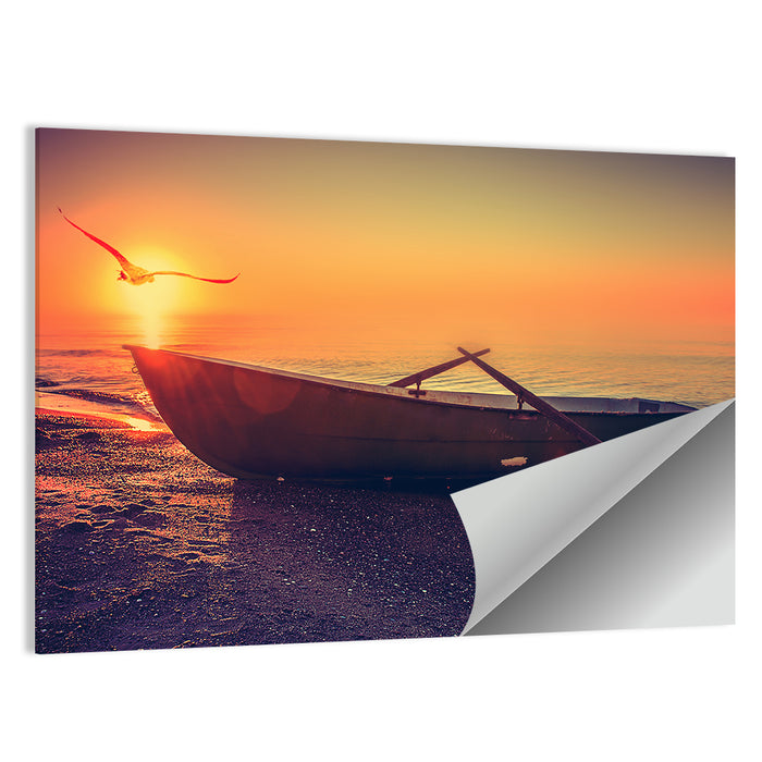 Sunset Rowboat on Sandy Shore Wall Art as a poster print