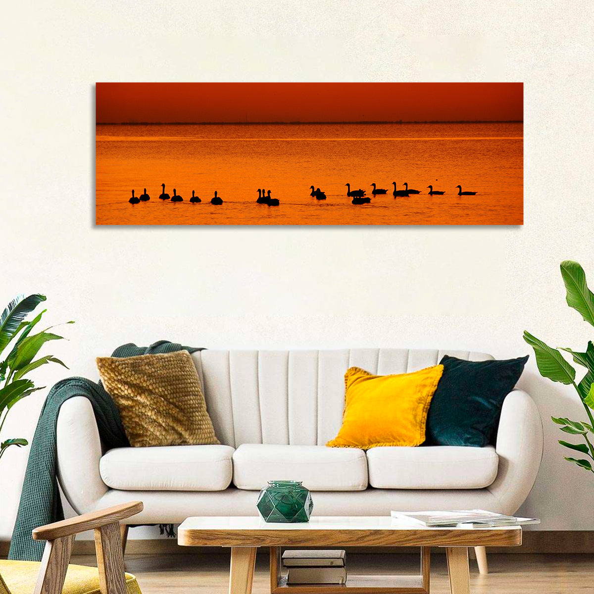 Geese Silhouettes at Orange Sunset Wall Art in a room, panoramic