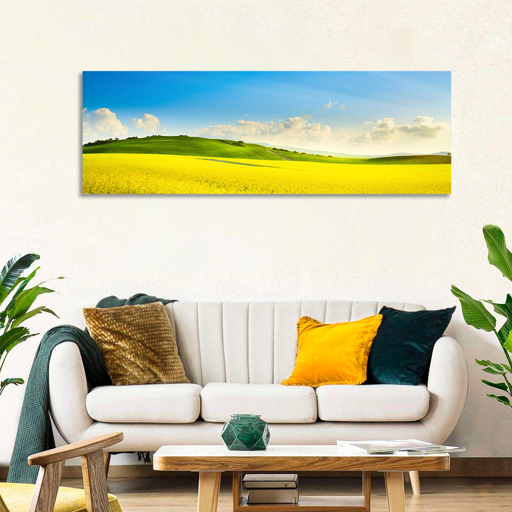Rapeseed Field and Rolling Hills Under Blue Sky Wall Art