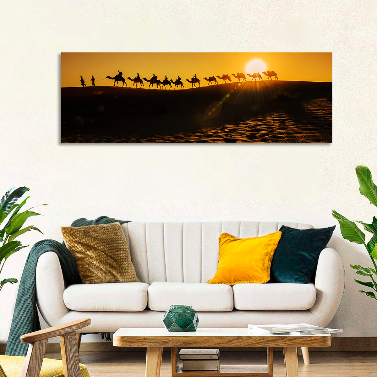 Camel Caravan Silhouette at Golden Sunset Wall Art in a room, panoramic