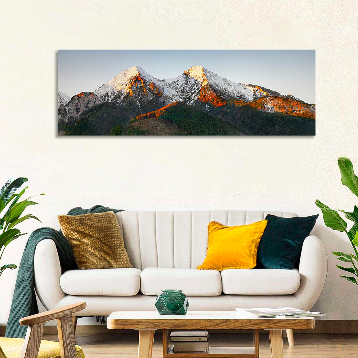 Sunlit Snow Capped Peaks Wall Art in a room, panoramic