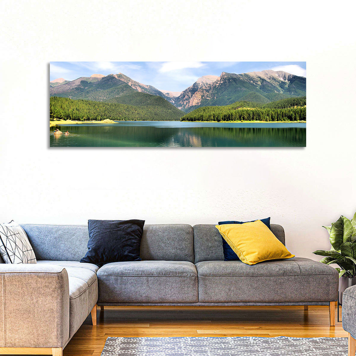 Mission Mountain Lake Reflection Wall Art in a room, panoramic