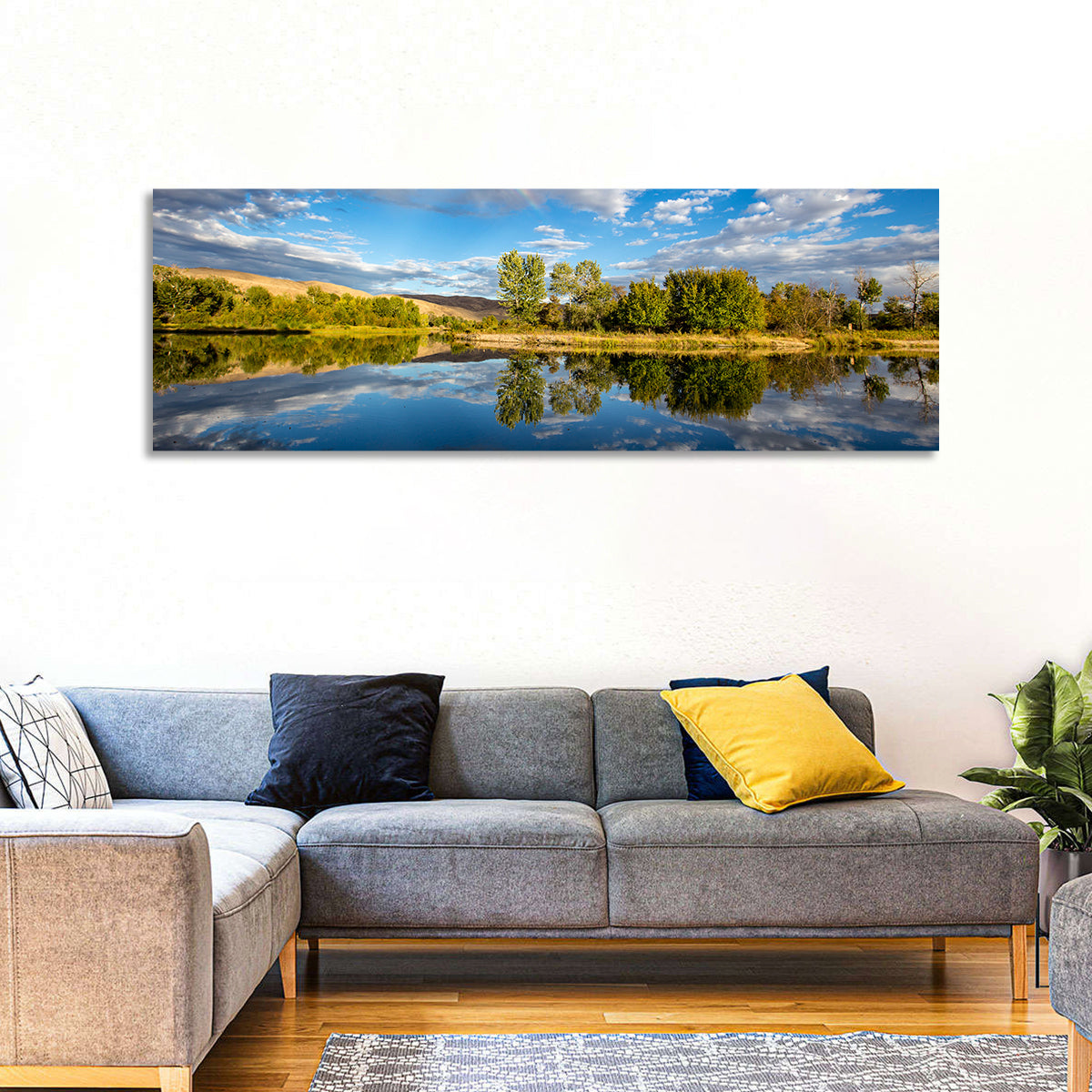 Boise River Rainbow Reflection Wall Art in a room, panoramic