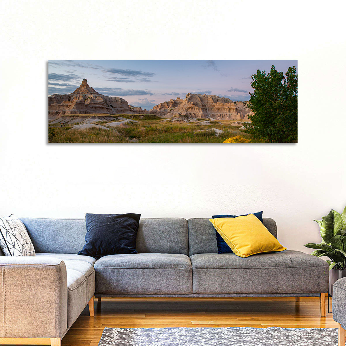 Badlands Golden Hour Meadow Wall Art in a room, panoramic