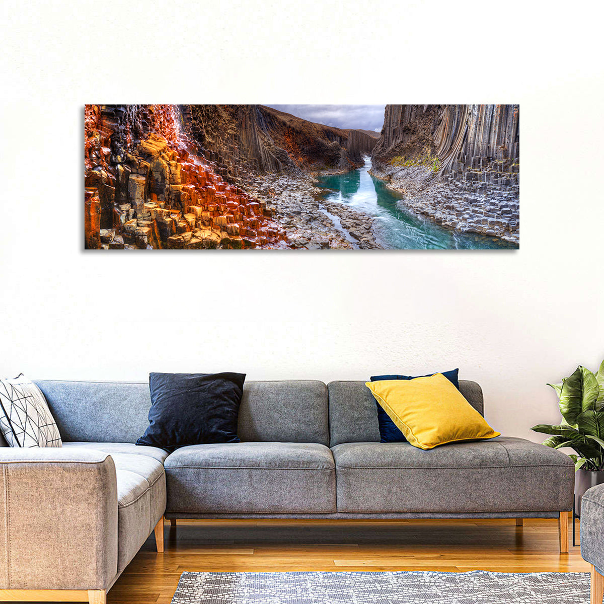 Studlagil Canyon Basalt Columns Wall Art in a room, panoramic