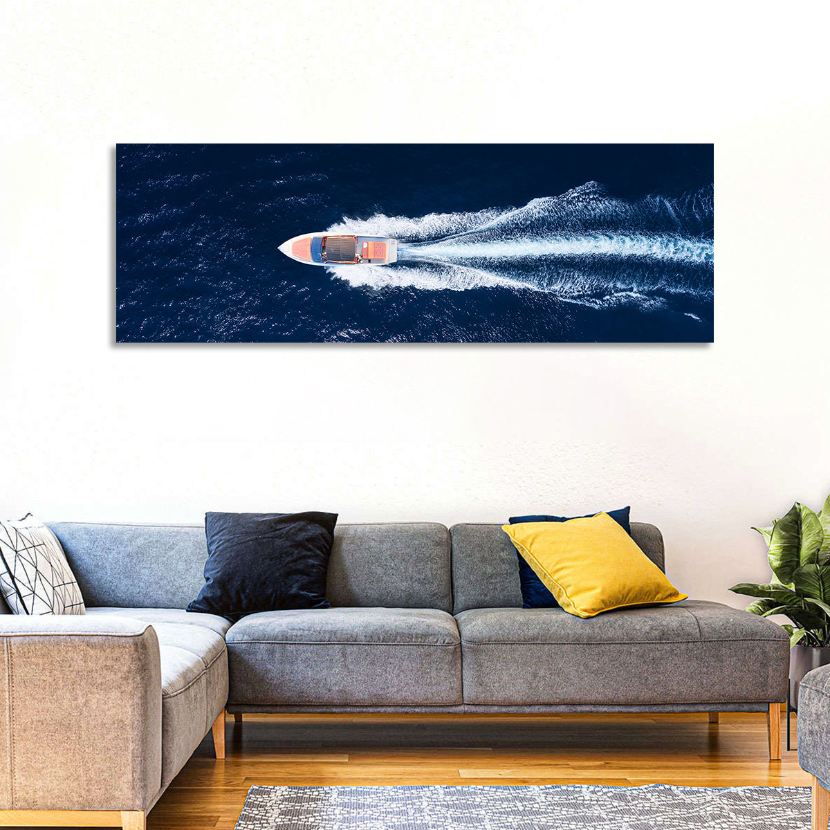Sleek Speedboat Over Navy Sea Wall Art in a room, panoramic