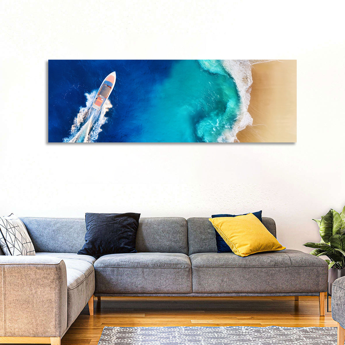 Speed Boat Over Turquoise Beach Wall Art in a room, panoramic
