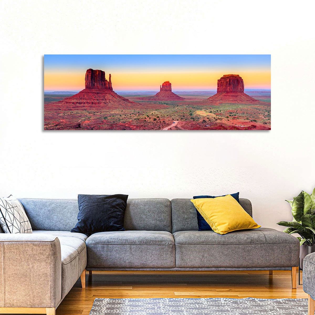 Monument Valley Sunset Vista Wall Art in a room, panoramic