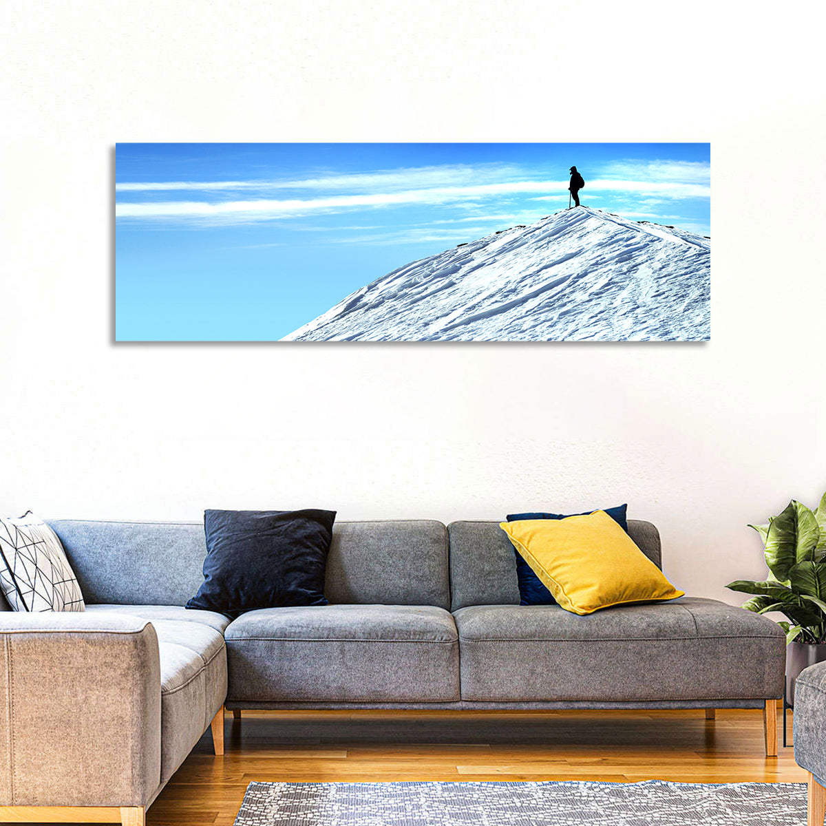 Mountaineer Summit Silhouette Wall Art in a room, panoramic