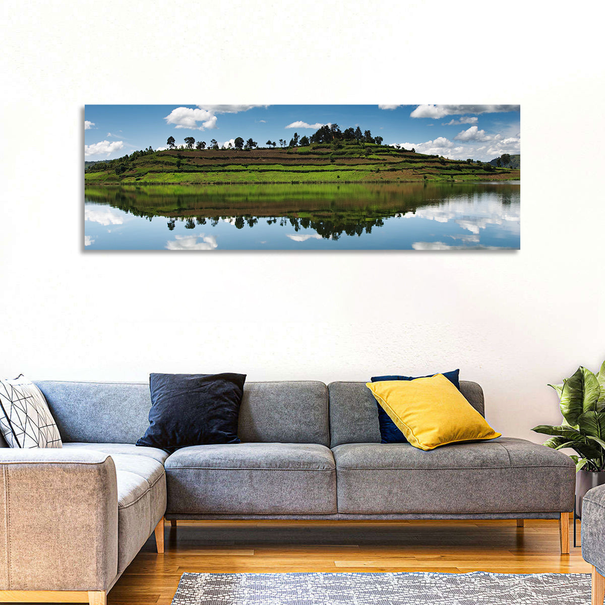Bunyonyi Lake Reflection Wall Art in a room, panoramic