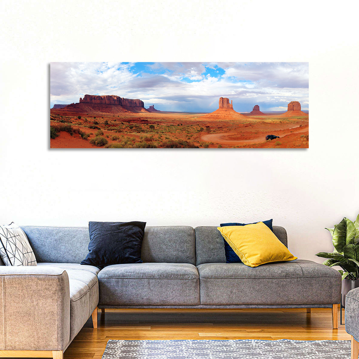 Mitten Buttes at Monument Valley Wall Art in a room, panoramic