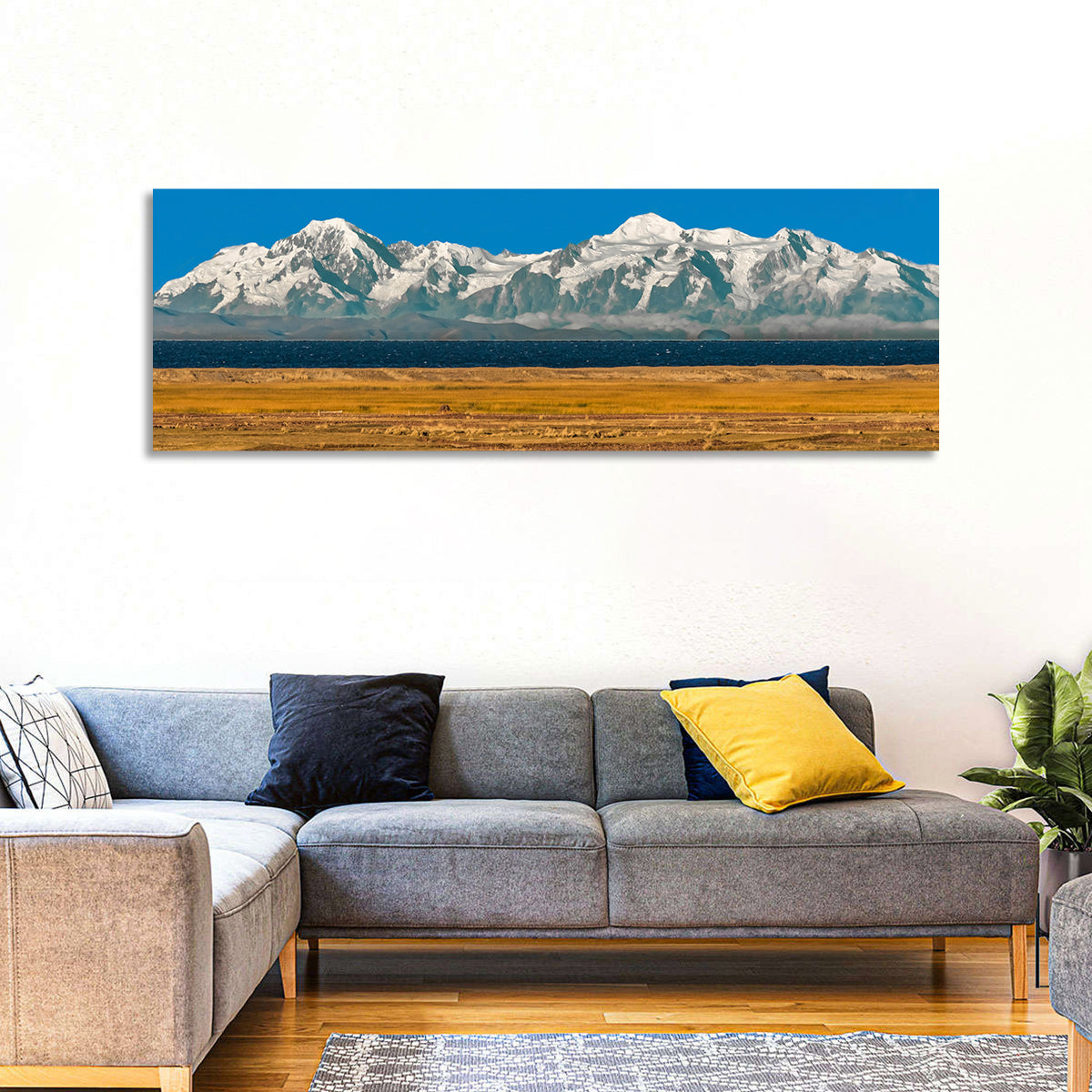 Snow-capped Peaks Over Lake Titicaca Wall Art in a room, panoramic