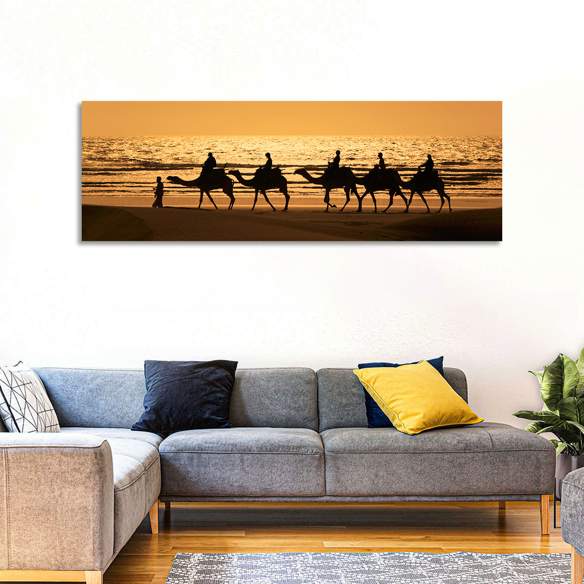 Camel Caravan Silhouette on Wet Sand Wall Art in a room, panoramic