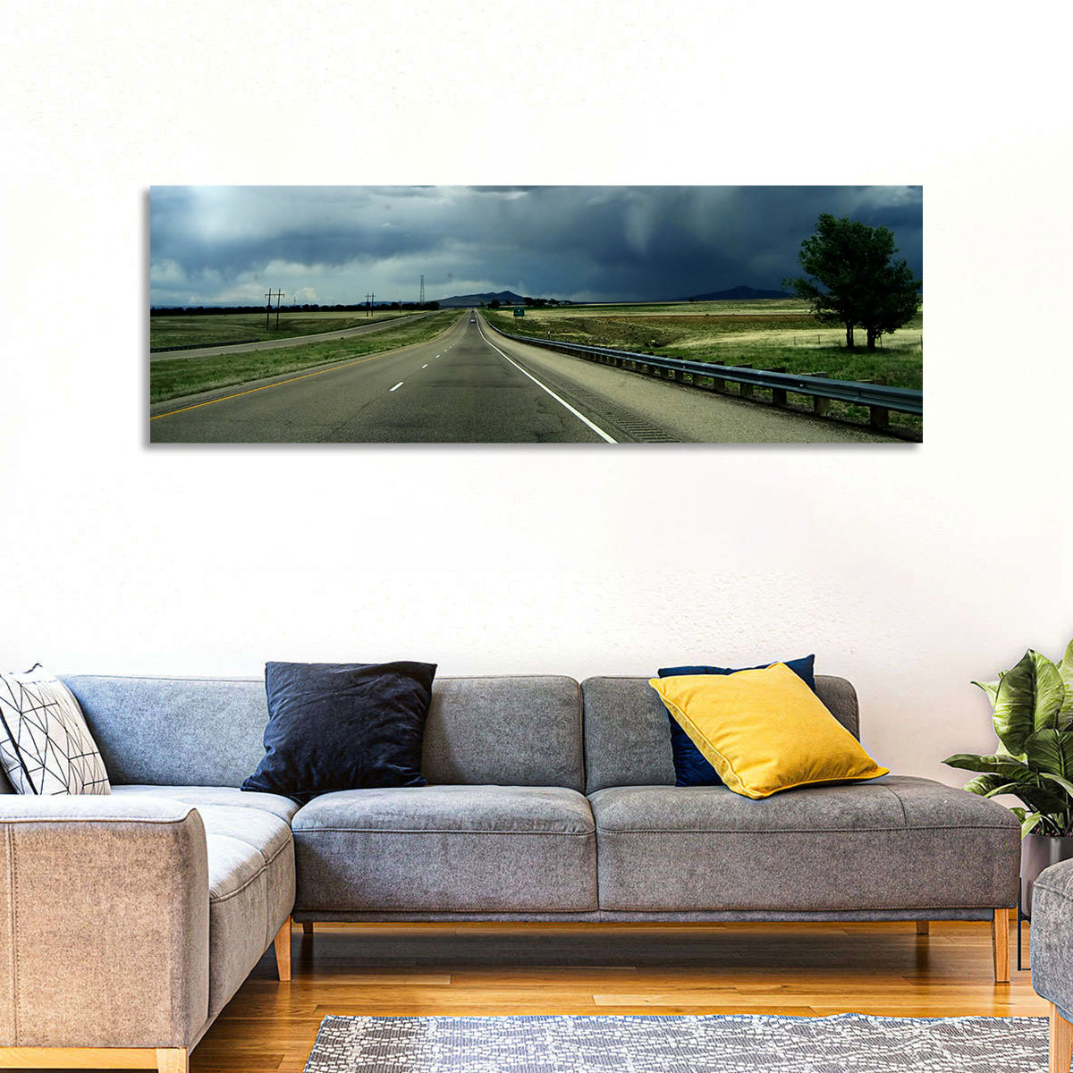 Stormy New Mexico Highway Wall Art in a room, panoramic