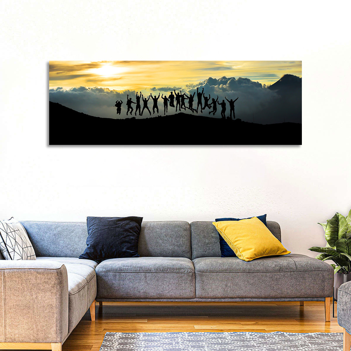Golden Team Silhouettes at Sunset Wall Art in a room, panoramic