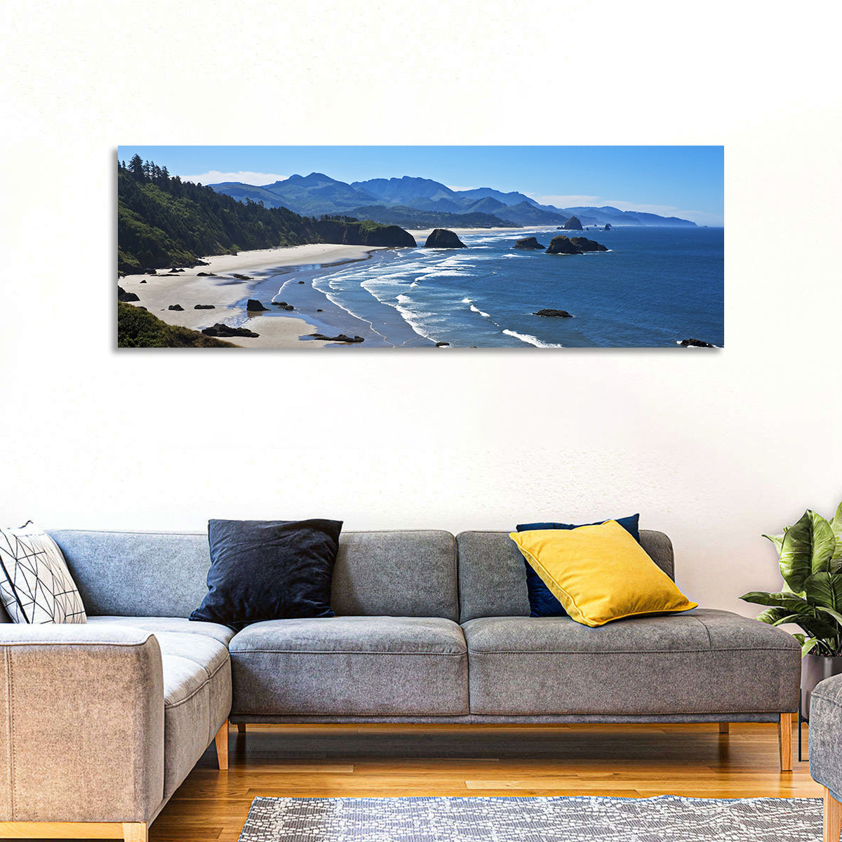 Cannon Beach Morning Shoreline Wall Art in a room, panoramic