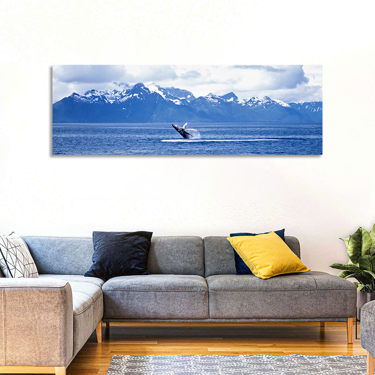Humpback Whale with Snow Capped Mountains Wall Art in a room, panoramic