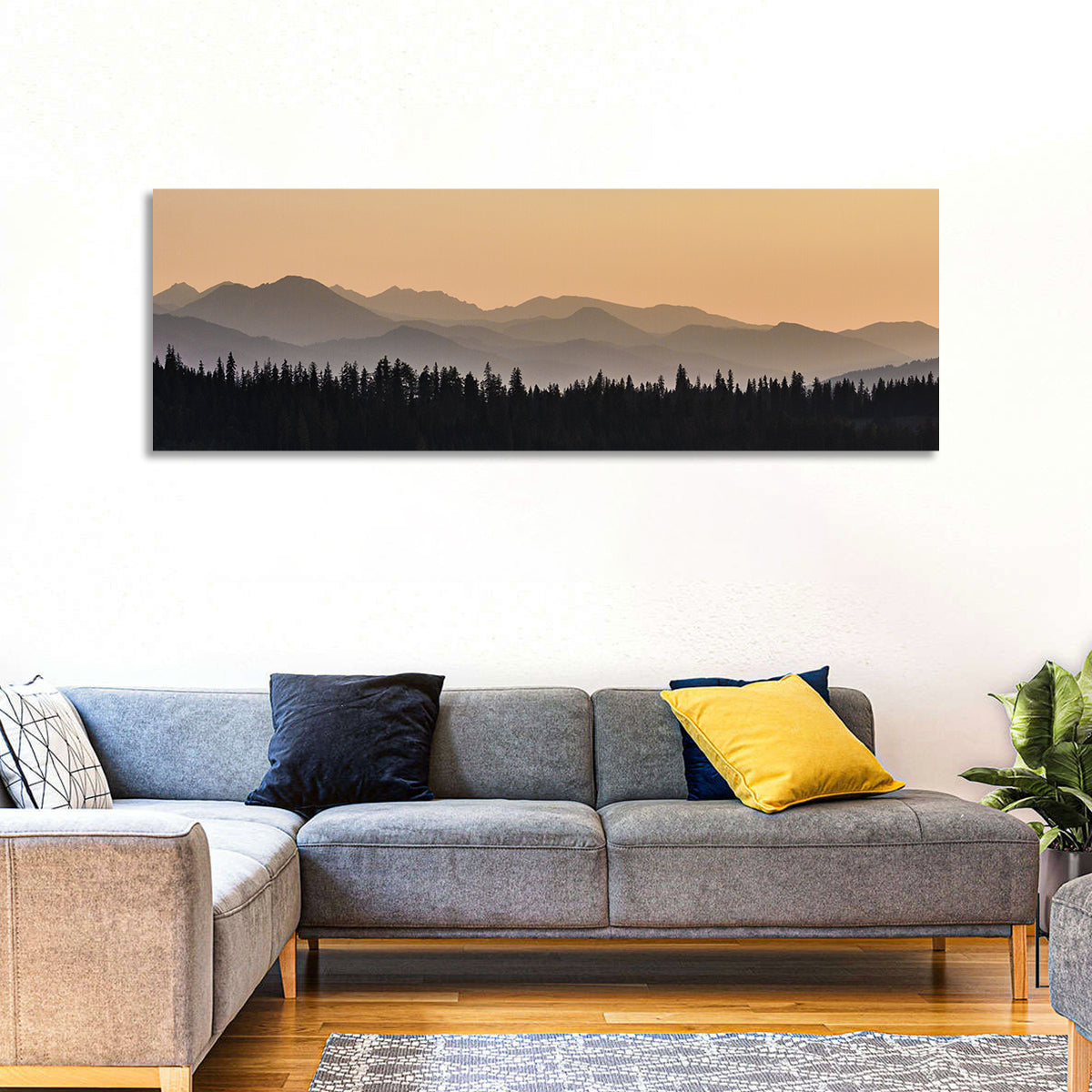 Lavender Mountain Ridge Silhouettes Wall Art in a room, panoramic