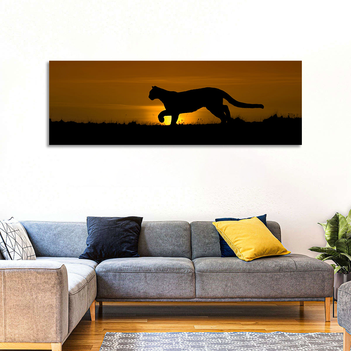 Cougar Silhouette at Sunset Wall Art in a room, panoramic