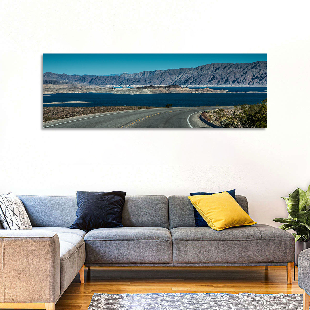 Lake Mead Curved Road Wall Art in a room, panoramic