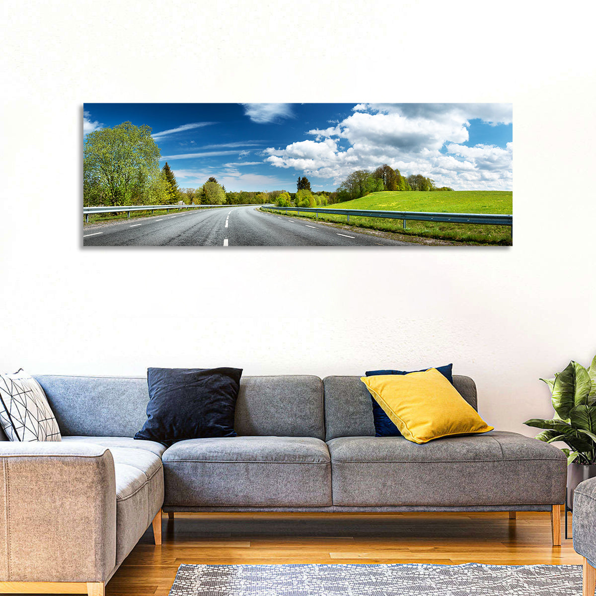 Sunlit Asphalt Road Wall Art in a room, panoramic