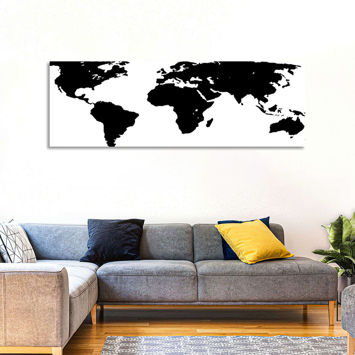 Minimalist Black World Map Wall Art in a room, panoramic
