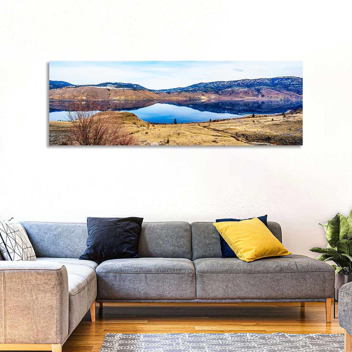 Kamloops Lake Winter Reflection Wall Art in a room, panoramic