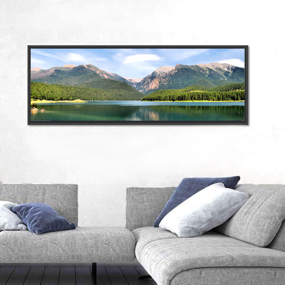 Mission Mountain Lake Reflection Wall Art in a room, panoramic