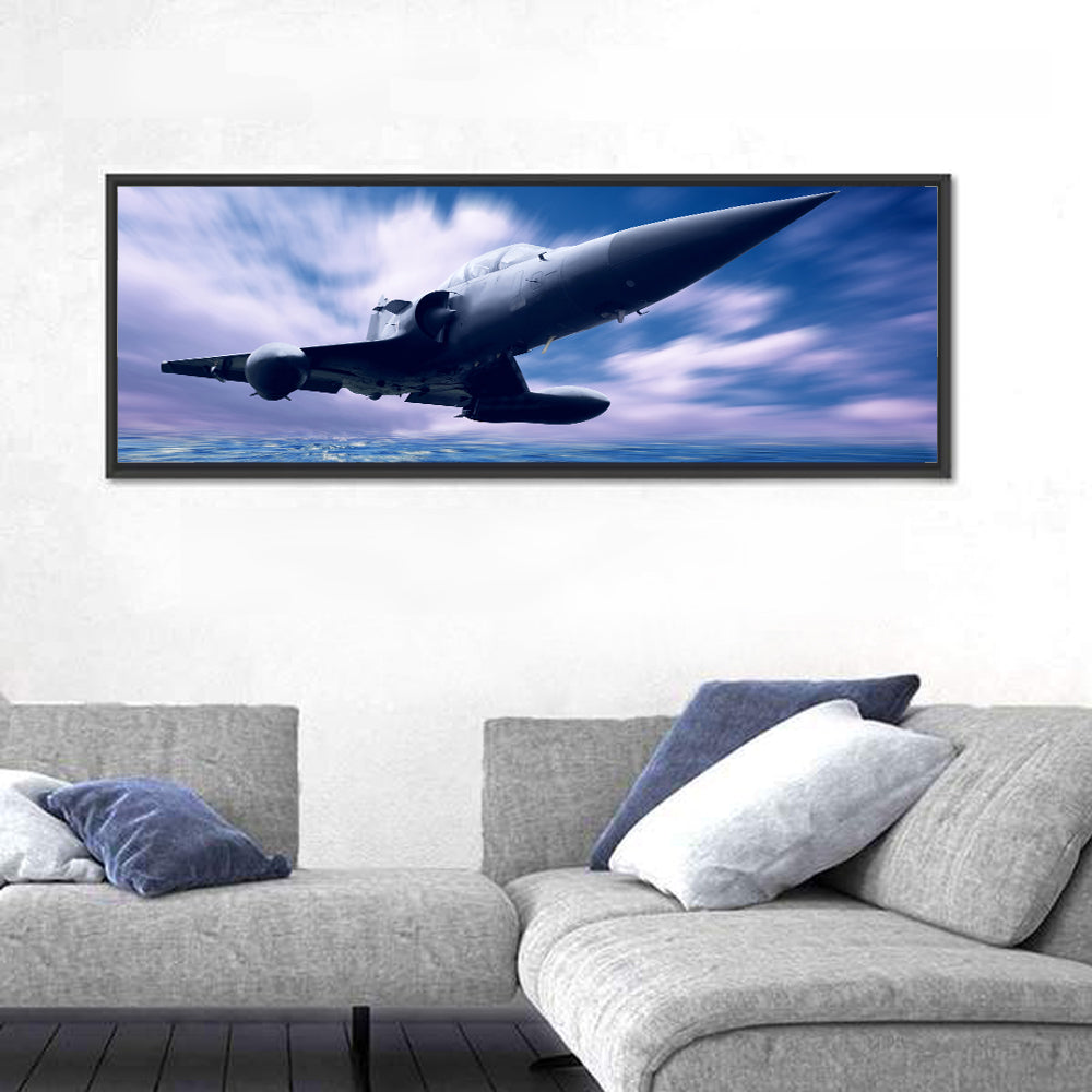 Fighter Jet Ascending Over Clouds Wall Art in a room, panoramic