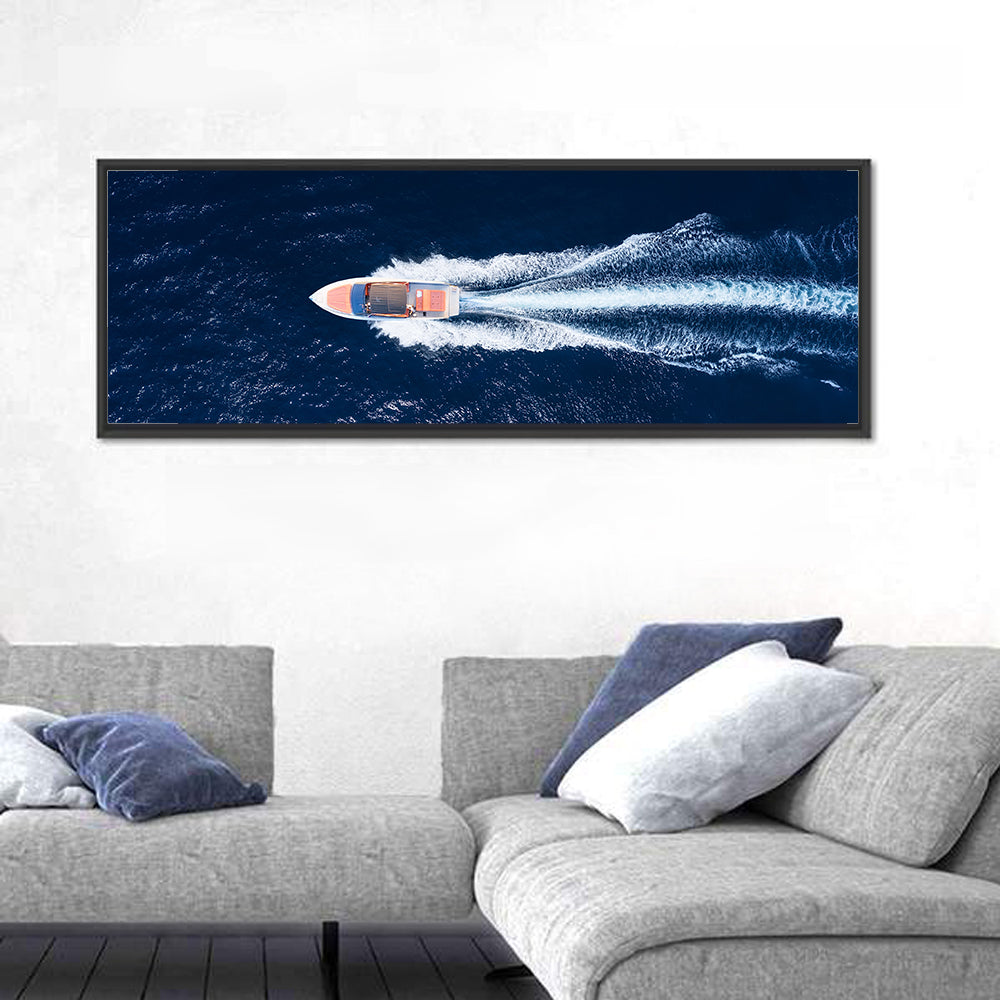 Sleek Speedboat Over Navy Sea Wall Art in a room, panoramic