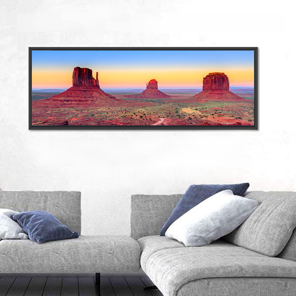 Monument Valley Sunset Vista Wall Art in a room, panoramic