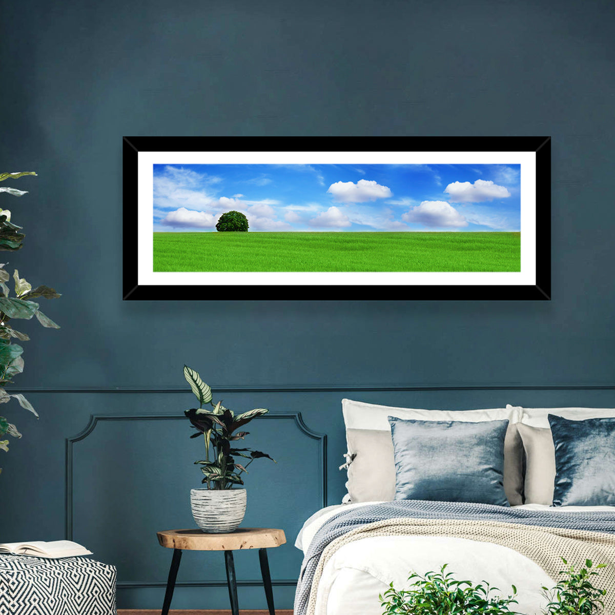 Solitary Tree Over Green Meadow Wall Art in a room, panoramic