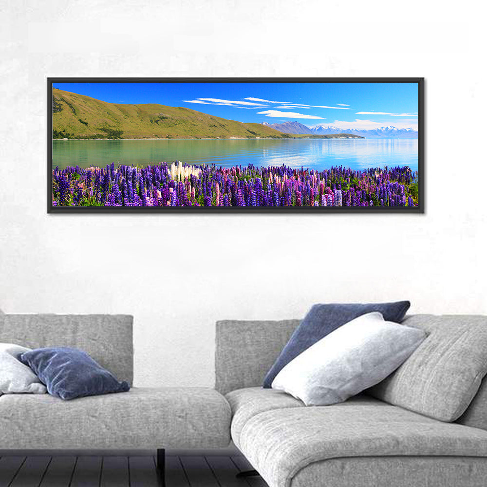 Lake Tekapo Lupine Fields Wall Art in a room, panoramic