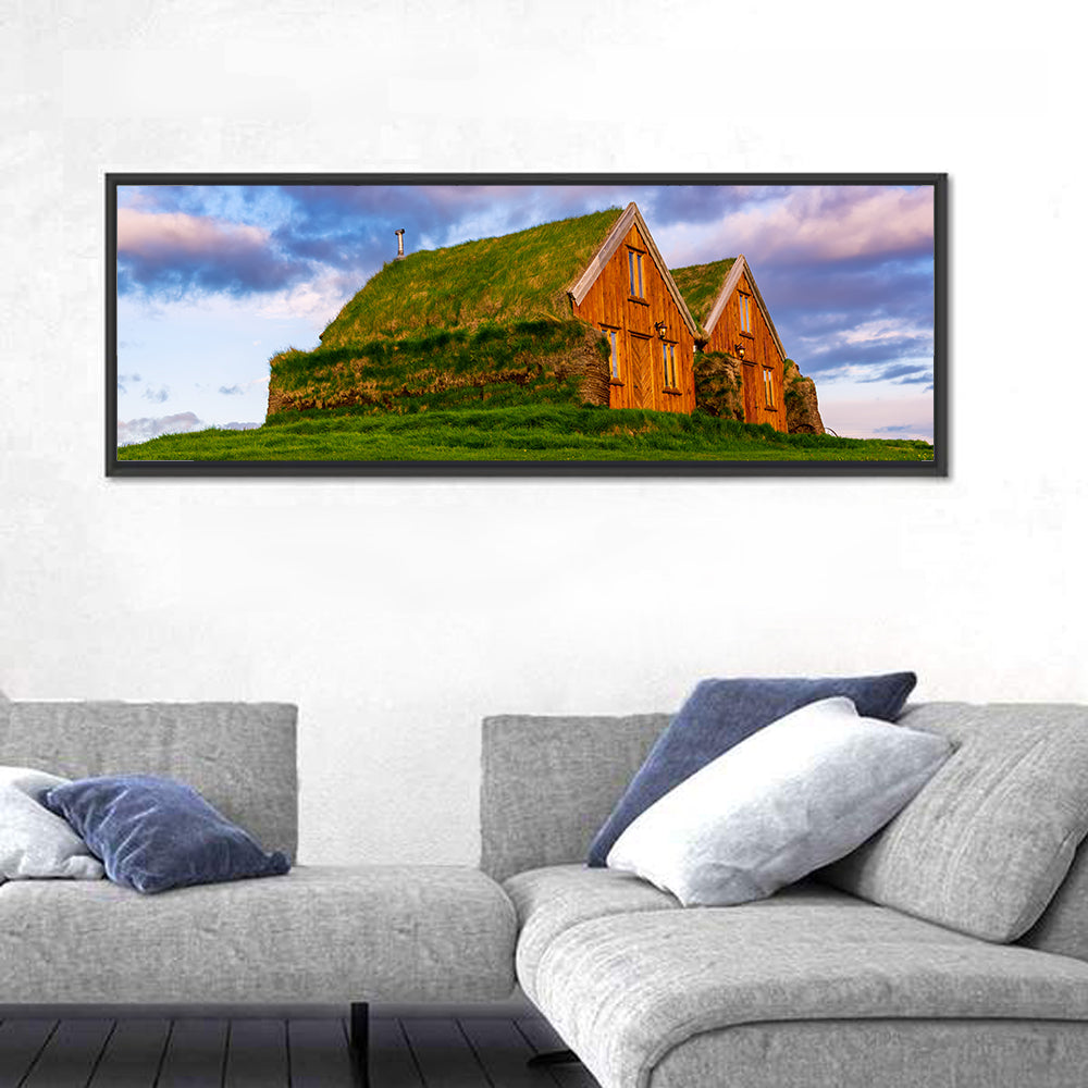 Icelandic Turf Houses at Dusk Wall Art in a room, panoramic