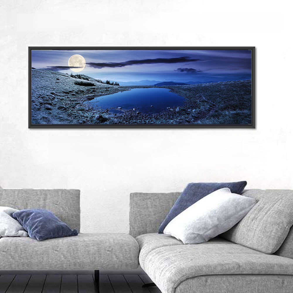 Mountain Lake at Night Wall Art in a room, panoramic