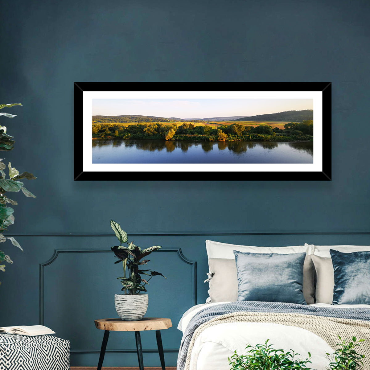 Peaceful River Sunset Wall Art in a room, panoramic