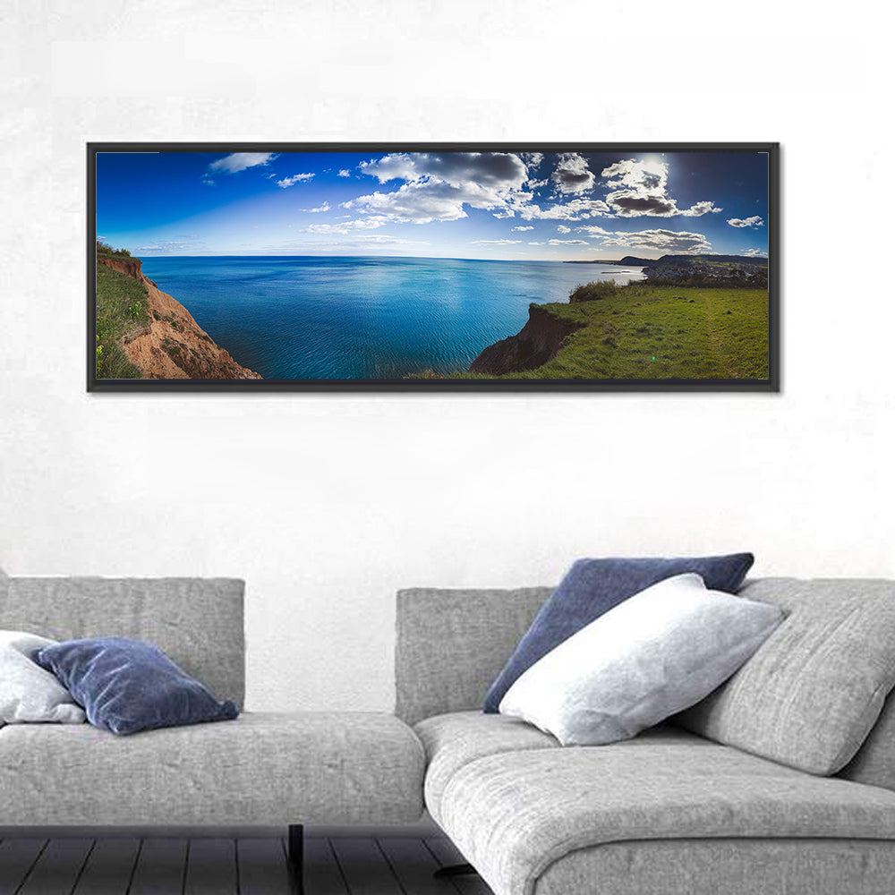 Sidmouth Cliffs and Sea View Wall Art in a room, panoramic