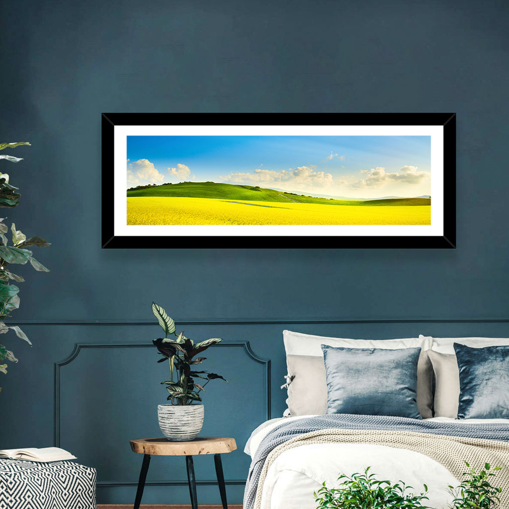 Rapeseed Field and Rolling Hills Under Blue Sky Wall Art