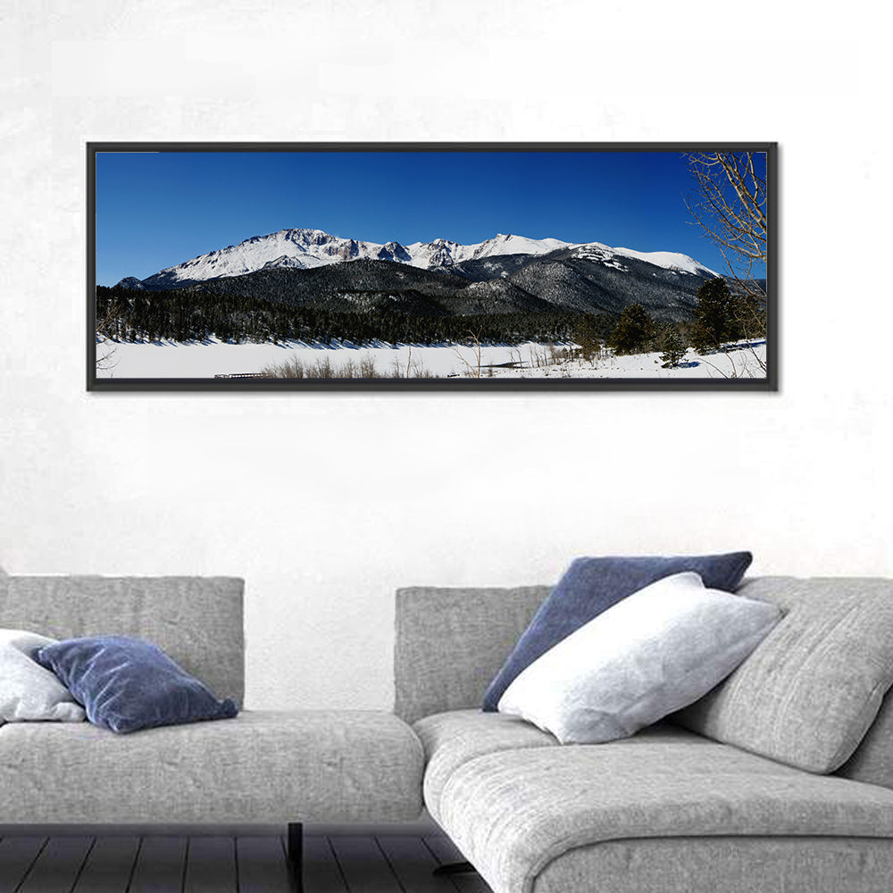 Pikes Peak Winter View Wall Art in a room, panoramic