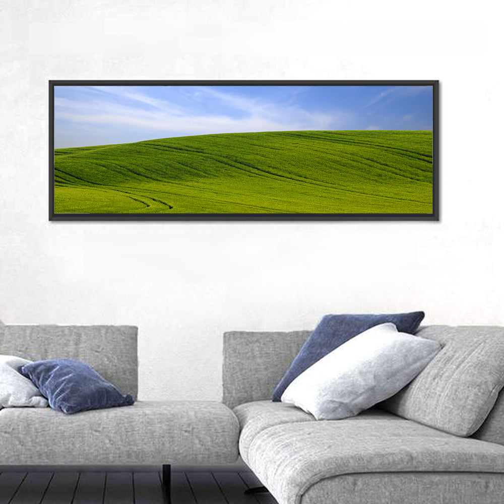 Rolling Green Hill with Blue Sky Wall Art in a room, panoramic