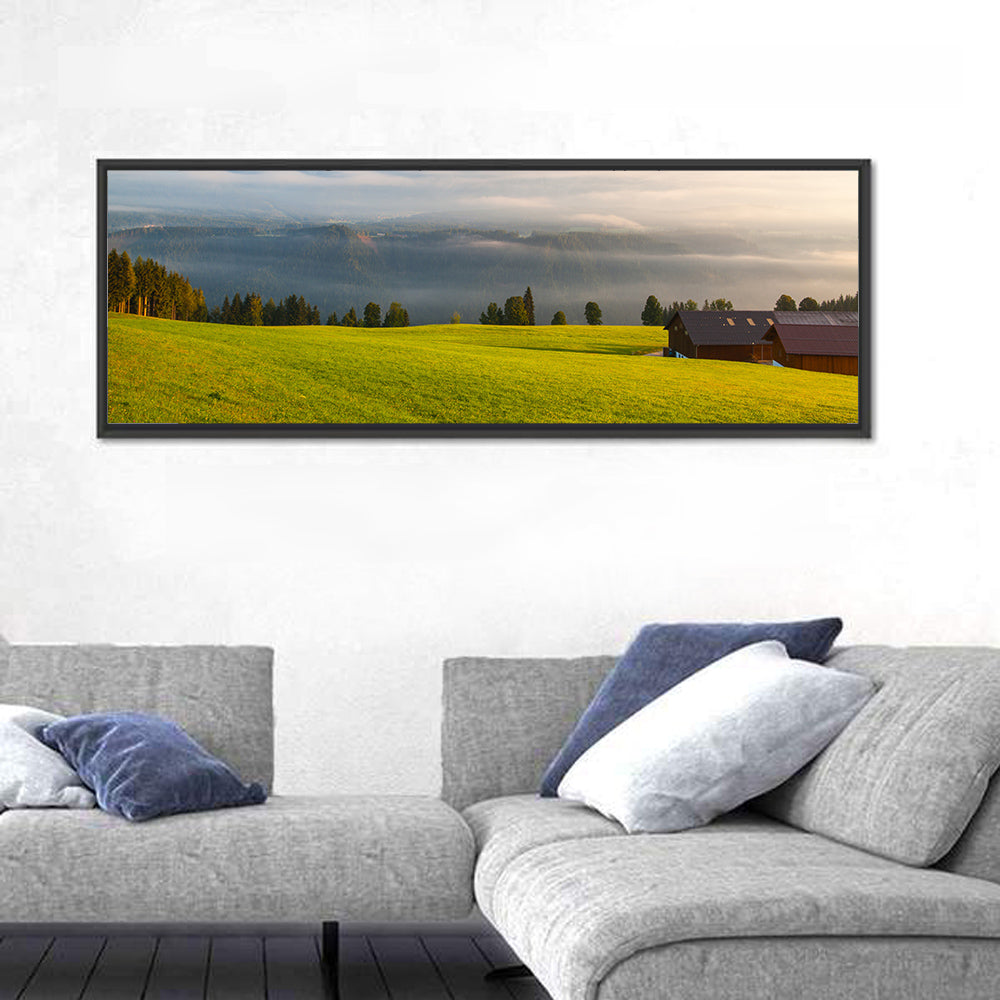 Sunlit Mountain Clouds Wall Art in a room, panoramic